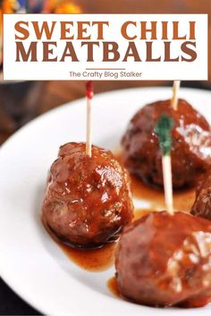 some meatballs are sitting on a plate with toothpicks