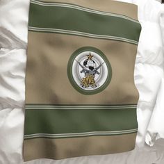 a flag is laying on top of a bed