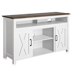 a white entertainment center with wooden top