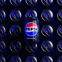 a pepsi can is sitting in front of many soda bottles with the word pepsi on them