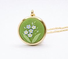 This is a handcrafted personalized locket necklace with 3 photos/messages inside, a detailed design from clay and metal base. Best gift ideas for mother, wife, sister, aunt, daughter, or grandmother for Mother's Day, wedding, her birthday, or other occasions. 🍃MANUFACTURING AND PROCESSING TIME This jewelry is already made and is ready to be personalized with photos/text for you. I create by hand each piece of jewelry, the design is intricate and delicate. Due to the handmade nature of the item, Mother's Day Locket Necklace, Handmade Locket Necklace For Mother's Day Gift, Mother's Day Flower Pendant Locket Necklace Gift, Mother's Day Engraved Keepsake Locket Necklace, Locket Necklace For Her - Mother's Day Gift, Mother Christmas Gifts, Photo Locket, Message Jewelry, Unique Birthday Gifts