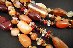 Summery color palette of gorgeous polished multi-strand beaded necklace comprised of Carnelian, Citrine, Yak bone and glass beads for your favorite sun goddess! 32 inches long and finished with a white brass lobster claw clasp on a 2.5 inch adjustable chain. Frog Necklace, Multi Strand Beaded Necklace, Sun Goddess, Carnelian Necklace, Multi Strand, Sell Items, Beaded Necklaces, Lobster Claw, Citrine