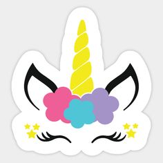 a sticker with a unicorn's face and stars on it