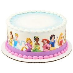 there is a cake with princesses on the frosting and icing toppings