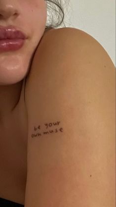 a woman's arm with the words be your own music tattooed on her left arm