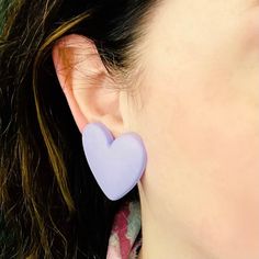 The perfect shade of bright lavender to capture spring vibes and match all your early 90's prints. Heart-shaped stud earrings in a fun puffy type of acrylic that looks a bit like polymer clay but is lighter weight so won't weigh down your ears. 1.37 inches (3.5 cm) long and 1.57 inches (4 cm) wide Stainless steel studs Lightweight matte finish acrylic (looks and feels a bit like polymer clay, but lighter weight) Trendy Purple Heart Earrings, Trendy Purple Heart Earrings For Gift, Trendy Purple Heart Earrings As Gift, Trendy Lavender Earrings For Gift, Purple Clay Earrings, Heart Stud Earrings, Spring Vibes, Bright Purple, Heart Studs