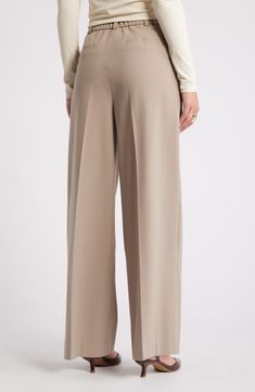 Move from desk days to drinks dates in gracefully draped pants cut from a feel-good fabric. 30" inseam; 24" leg opening; 13" front rise; 16 1/2" back rise (size 8) Zip fly with hook-and-bar closure 62% REPREVE® recycled polyester, 33% rayon, 5% spandex REPREVE recycled polyester is made from 100% post-consumer recycled plastic bottles Machine wash, tumble dry Imported Loosely Fitted Full Length Solid Dress Pants, Office Wide-leg Pants With Elastic Waistband, Tailored Wide-leg Pants With Elastic Waistband, Beige Wide Leg Bottoms For Office, Beige Wide Leg Bottoms For Business Casual, Elegant Beige Straight Leg Bottoms, Elegant Full-length Spring Bottoms, Elegant Full Length Bottoms For Spring, Formal Full-length Dress Pants With Elastic Waistband