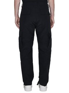 ->cotton, 100% Cotton Straight Pants With Functional Pockets, Fitted Cotton Cargo Pants With Functional Pockets, Cotton Bottoms With Functional Pockets And Tapered Leg, Marcelo Burlon, Zegna Shoes, Innovative Fashion, Cargo Trousers, Luxury Retail, Women Collection