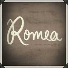 the word rome written in white on a brown background