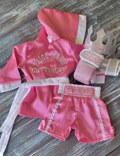 "Do you need something incredible for you little fighter? About this Boxing set? THIS listing is for Baby boxing set ROBE Personalized+shorts personalized and wearable gloves personalized + CROWN For sizes 3T and Up please check Listing below: https://www.etsy.com/MelissasStitches/listing/866279764/kids-boxing-set-2t-3t-4t-5t?utm_source=Copy&utm_medium=ListingManager&utm_campaign=Share&utm_term=so.lmsm&share_time=1618843290592 If you would like complete set please click on listing below: https:/ Kids Outfits Daughters, Newborn Mom, Personalized Robe, Baby Box, Royal Baby, Baby First Birthday, Baby Needs, Baby Outfits, Kids Boxing