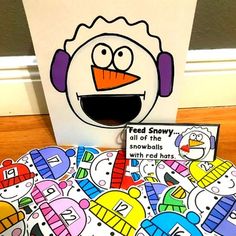 an image of a cartoon character with headphones on and some cards in front of it