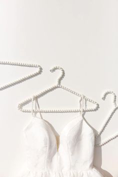 Display your jackets, wedding dress or even bridesmaid dresses on these trendy Pearl Hangers! These beauties will bring charm to your wedding day and are the perfect accessories for your wedding pictures. Pearl Hangers, Pearl Hanger, Bride Hanger, Wedding Dress Hanger, Dress Hanger, Wedding Hangers, Special Dresses, Wedding Pictures, Beautiful Bride