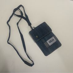 an id card holder with a lanyard strap attached to it on a white surface