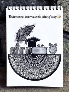 a spiral notebook with an image of a graduation cap and books on it, which reads teachers create tomorrow in the minds of today