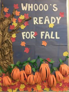 a bulletin board with pumpkins and leaves on it that says whoo's ready for fall