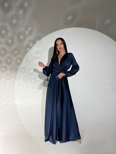 Fabric: Satin 60% polyester, 38% viscose, 2% elastane Longsleeve Maxi length V-neckline Wrap dress Belt included Dress length: 144 cm Sleeve length: 61 cm Color: white, black, beige, navy blue, emerald Size: S, M, L, XL Chic Long Sleeve V-neck Evening Dress, Elegant V-neck Dress With Surplice Neckline For Fall, Blue V-neck Maxi Dress For Night Out, Chic V-neck Long Sleeve Party Dress, Elegant Long Sleeve V-neck Dress For Night Out, Fall Cocktail Maxi Dress With V-neck, Elegant Fitted Wrap Dress With V-neck, Elegant Fitted V-neck Wrap Dress, Fall Cocktail Long Sleeve V-neck Dress