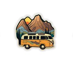 a sticker with an image of a van and mountains in the background on a white surface