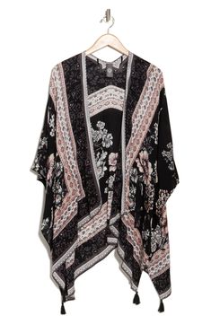 Love to layer this lightweight ruana that is covered in a garden bird design that is perfect for your next warm-weather adventure. 36" length (size O/S) Open front Short sleeves 100% rayon Hand wash, dry flat Imported Casual Boho Print Outerwear For Spring, Casual Flowy Poncho For Spring, Casual Flowy Spring Poncho, Spring Bohemian Patterned Outerwear, Bohemian Spring Patterned Outerwear, Bohemian Patterned Spring Outerwear, Casual Summer Outerwear With Boho Print, Bohemian Black Outerwear For Vacation, Black Bohemian Outerwear For Vacation