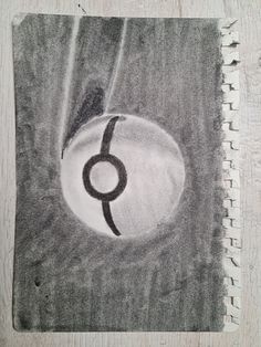 a pencil drawing of an eyeball on a piece of paper with the letter o in it