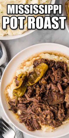 a white plate topped with meat and mashed potatoes