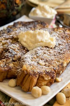 french toast with butter and nuts on a plate