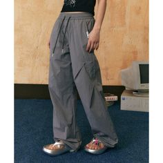 The EZEK Wide-Leg Drawstring Lounge Pants are unisex, relaxed fit casual trousers featuring a comfortable drawstring waist and convenient pockets. Made from high-quality, breathable fabric, these lounge pants ensure comfort and style for everyday wear. Model's measurements: Height 160cm, Weight 42kg, Bust/Waist/Hip 79/58/88, Wearing size L Casual Baggy Bottoms With Drawstring, Casual Parachute Pants With Drawstring, Casual Cargo Pants With Drawstring For Leisure, Casual Drawstring Parachute Pants, Casual Straight Parachute Pants With Drawstring, Gray Cotton Parachute Pants For Summer, Baggy Gray Parachute Pants For Summer, Gray Baggy Parachute Pants For Summer, Casual Gray Parachute Pants With Loosely Fitted Hips