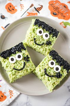 rice krispy treats decorated with googly eyes on a plate