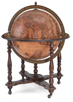 an old world globe on stand with wooden legs