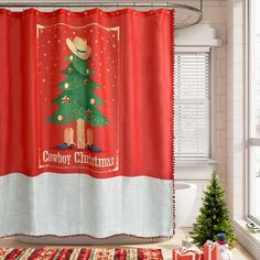 a shower curtain with a christmas tree on it