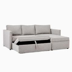 a sectional sofa with storage underneath it