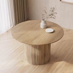 a wooden table with a vase on it