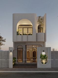 the front view of a modern house with balcony and balconies