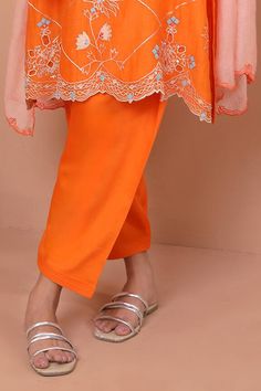 Orange kurta with thread embroidered floral vine motifs, applique work and cutwork. Comes with salwar and scallop border dupatta. - Aza Fashions Summer Chanderi Sets With Intricate Embroidery, Orange Fitted Dupatta With Intricate Embroidery, Embroidered Semi-stitched Sets, Embroidered Mulmul Sets For Summer, Semi-stitched Summer Sets With Intricate Embroidery, Summer Embroidered Mulmul Sets, Unstitched Multicolor Embroidered Salwar Kameez, Festive Orange Floral Embroidery Set, Fitted Embroidered Cambric Sets