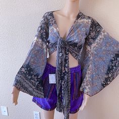 Bohemian Multicolor Silk Tops, Bohemian Silk Top With Floral Print, Silk Bohemian Top For Party, Bohemian Silk Top For Festival, Bohemian Silk Top For Party, Bohemian Multicolor Silk Blouse, Bohemian Silk Blouse For Fall, Flowy Silk Bohemian Blouse, Bohemian Silk Blouse For Beach