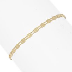 Meaning "double petals" in Italian, Stefano Oro's Doppia Petali chain bracelet is a true beauty. Inspired by the delicate beauty of petals, with each link designed to resemble a double petal, it symbolizes grace, elegance and natural beauty. Made in Italy, the exquisite chain is finely crafted in 14K yellow gold. A polished finish delivers across-the-room shine. Gold Chain Charm Bracelet In 14k Gold, Delicate Chain Gold Bracelet, Gold-tone 14k Gold Charm Bracelet, Tarnish Resistant White Gold Bracelet, Luxury Delicate Chain Gold Bracelet, Gold-tone Delicate Chain Bracelets, Gold-tone Delicate Chain Bracelet, Delicate Beauty, Gold Polish