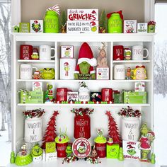 a shelf filled with lots of christmas items