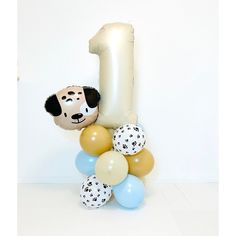 a number one balloon with balloons in front of it