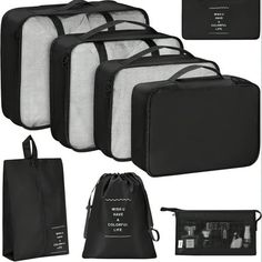 four pieces of black and white luggage