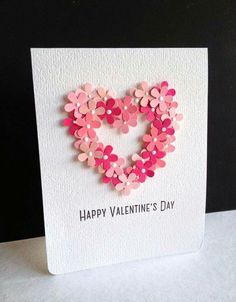 a valentine's day card with pink hearts in the shape of a heart