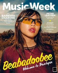 the cover of music week magazine with a woman wearing sunglasses on her head and an image of