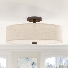 a living room scene with focus on the light fixture