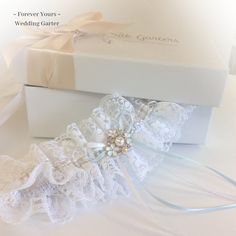 "Pretty white lace, with a central white and gold threaded ribbon. The lace is gently gathered onto a band, fine bows and a cluster of dainty flowers, complete this lovely garter. One size 14\"-22\" Sent in pretty tissue. Sorry, this item is not gift boxed. Usually in stock and dispatched within a few days, remember to add postage time. If you need your set urgently, please message me, I always try to help!" Adjustable Lace Bridal Accessories For Ceremony, Fitted Lace Bridal Accessories For Wedding, Elegant Bridal Accessories With Lace Trim For Wedding, Elegant Wedding Bridal Accessories With Lace Trim, Lace Bridal Accessories For Ceremony, Elegant Lace Bridal Accessories For Wedding, Elegant Lace Bridal Accessories For Marriage, Elegant Lace Bridal Accessories, Adjustable Lace Bridal Accessories For Wedding