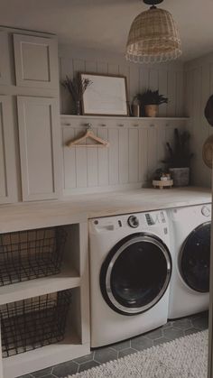 a washer and dryer in a small room