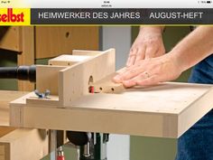 a person working on a piece of wood with a planer in the foreground