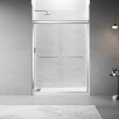 a bath room with a shower and a rug