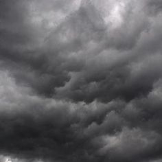 black and white photograph of clouds in the sky