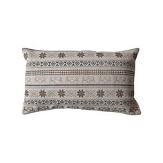 a decorative pillow with an intricate design on the front and back, in grey tones