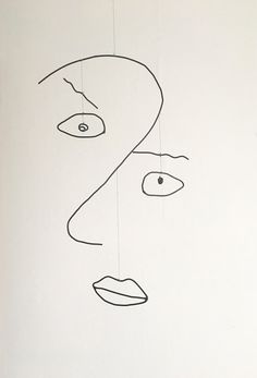 a black and white drawing of a woman's face with one eye open, the other half closed