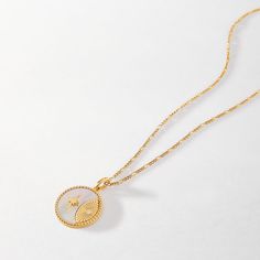 Inspired by vintage coins found in East Asia, these modern-day talismans carry icons of good fortune. The Solar Necklace, with a microcosmic galaxy of sun, star, and a moon symbolises dreams and aspirations for the future. In the world of feng shui, mother of pearl is believed to symbolize wealth and good luck. You go, Elegant Tarnish-resistant Medallion Necklace, Elegant Gold-tone Round Pendant Coin Necklace, Elegant Gold Medallion Chain Necklace, Elegant Gold Coin Necklace, Elegant Gold Medallion Necklace, White Plated Pendant Necklaces, Luxury Round Coin Necklace With Adjustable Chain, White Plated Pendant Necklace, Elegant Gold Plated Coin Necklace