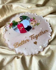 there is a personalized photo on the back of a pillow that says, better together